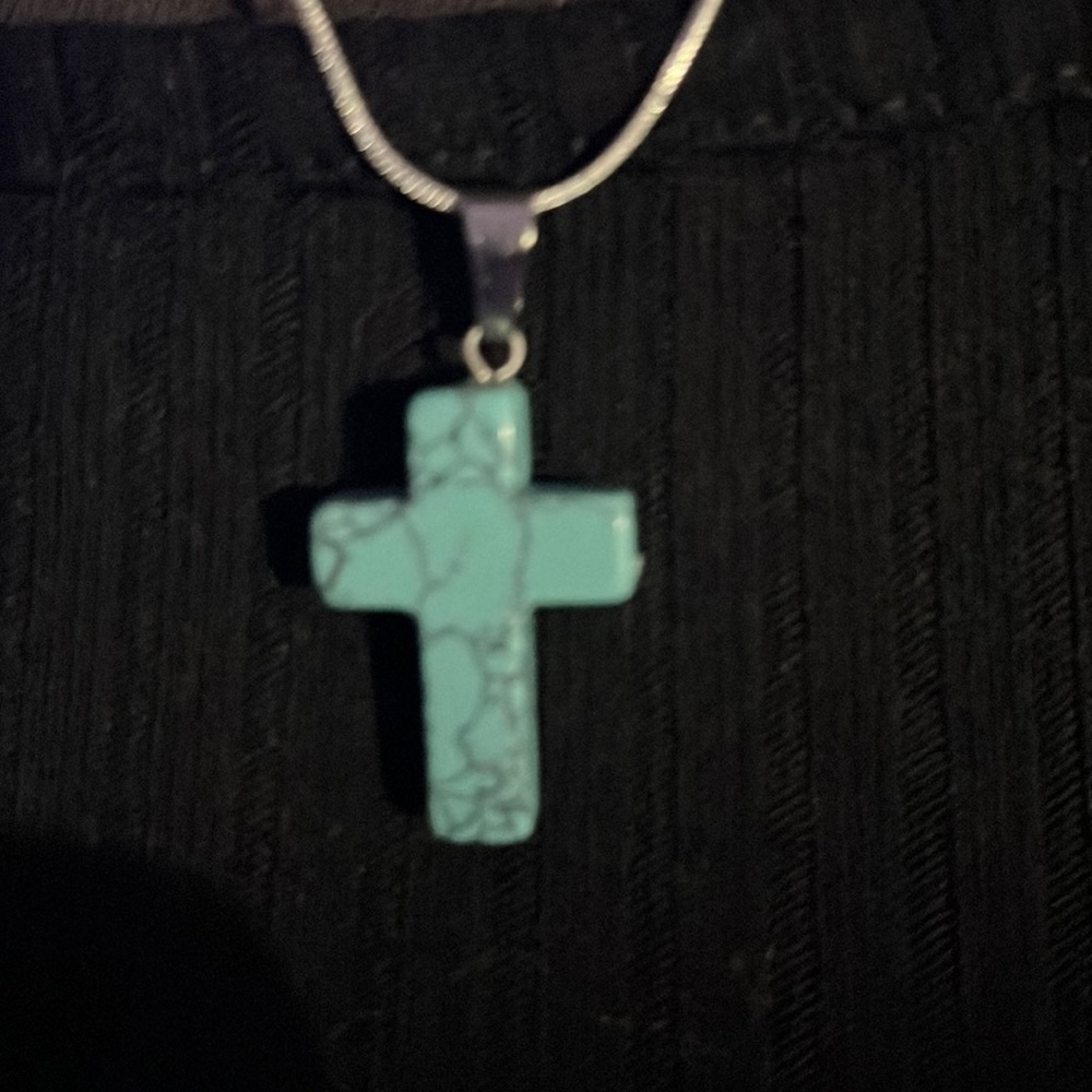 Turquoise cross necklace on silver chain